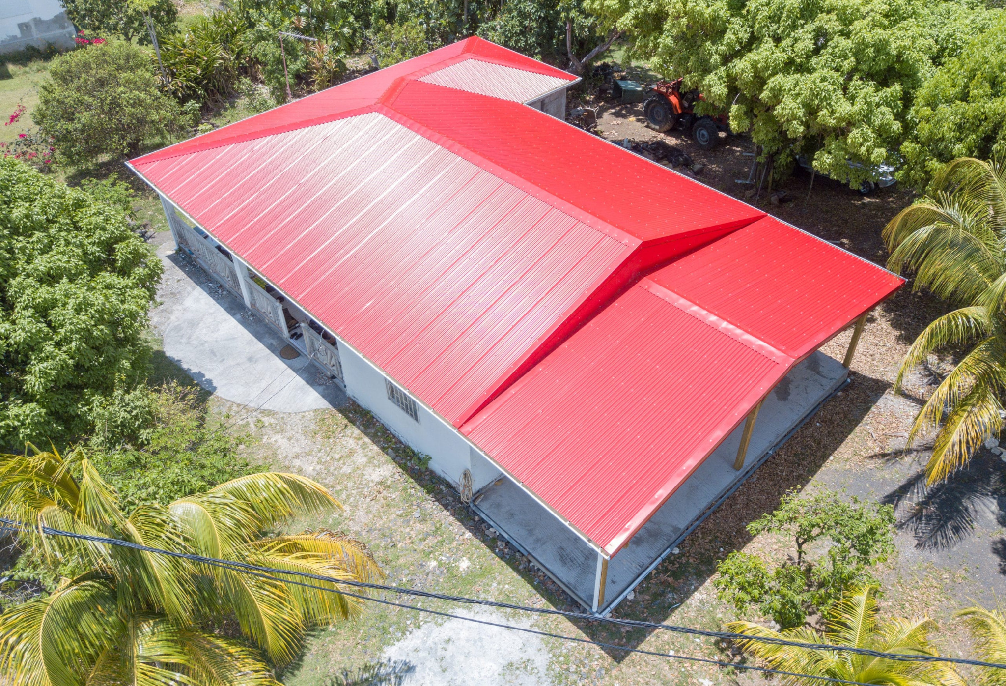 Projet 3 — toiture rouge rénovée à Sainte‑Rose